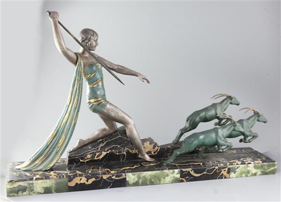 Dauvergne. An Art Deco bronzed spelter group of Diana the Huntress with three gazelles, 33.5in.